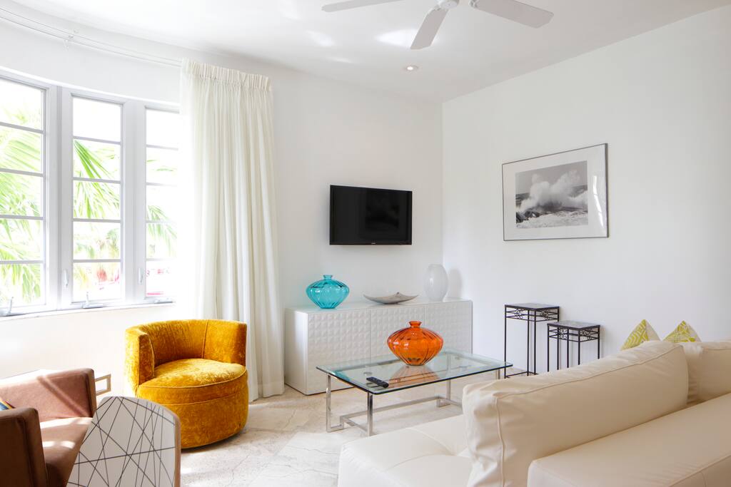 Living room with view of beach and ocean drive