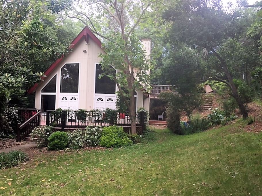 Deck off the front with BBQ and tables.