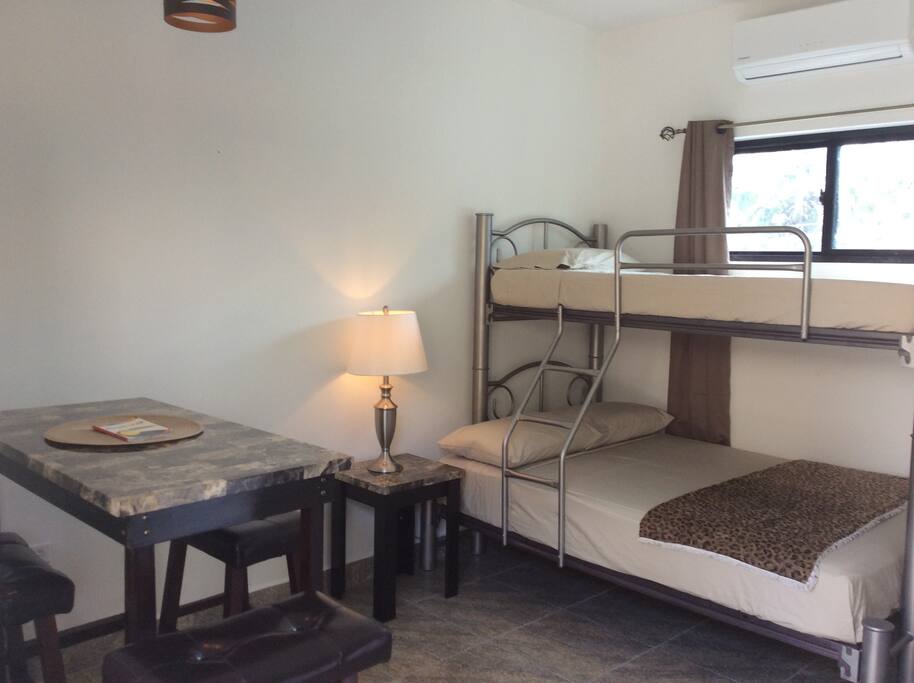 Room is brand new with space for 3 , hi top dining, coffee maker, fridge, microwave great AC