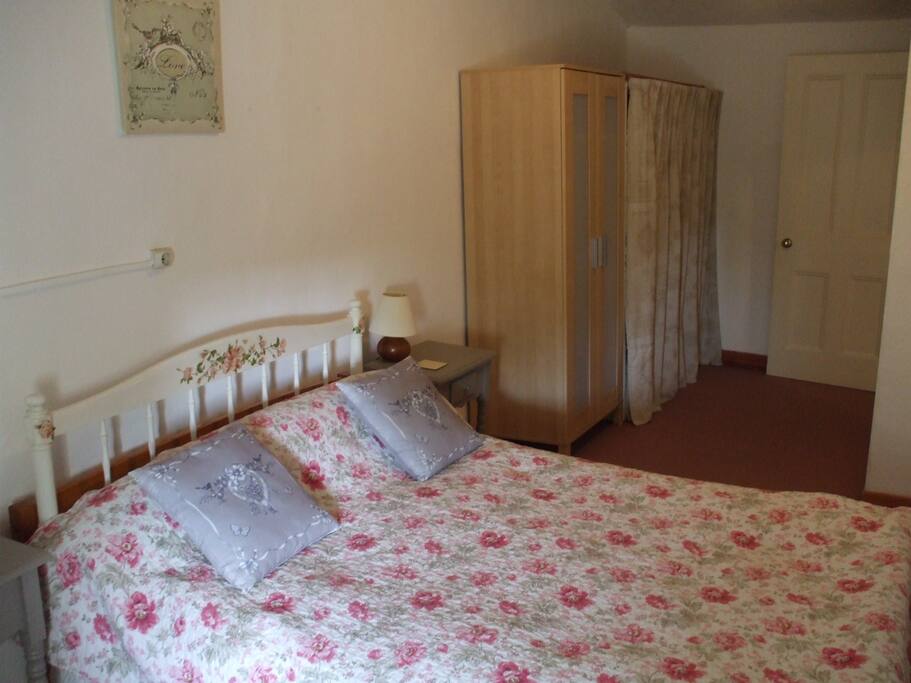 Bedroom One with double bed.
