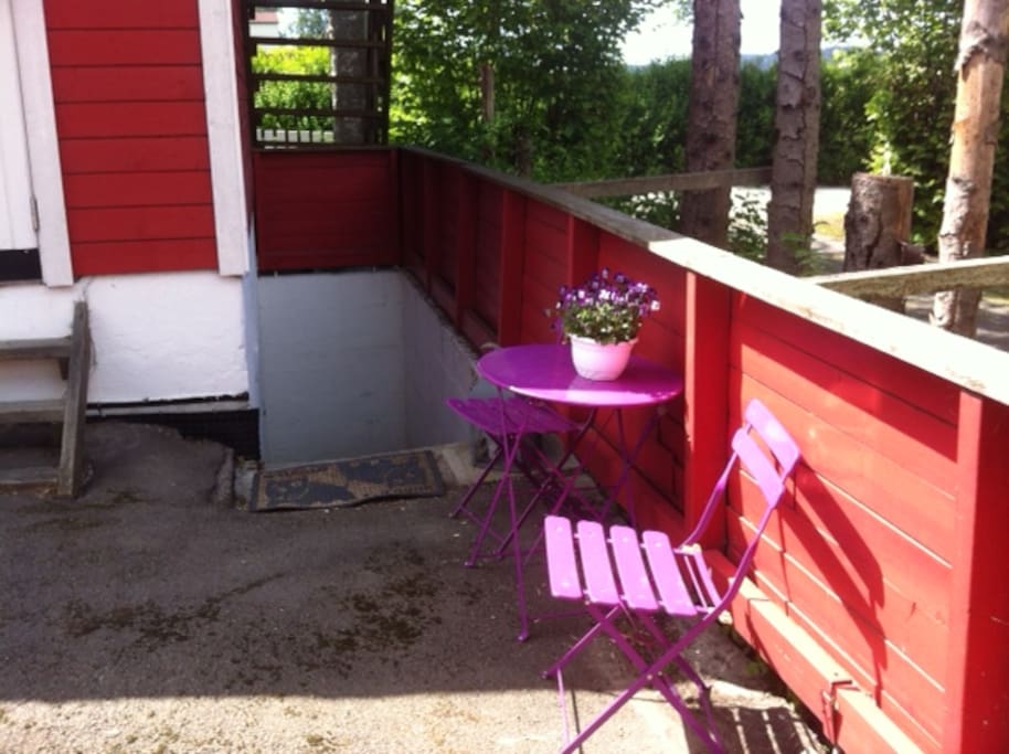 Access down to the apartment, and coffee table outside