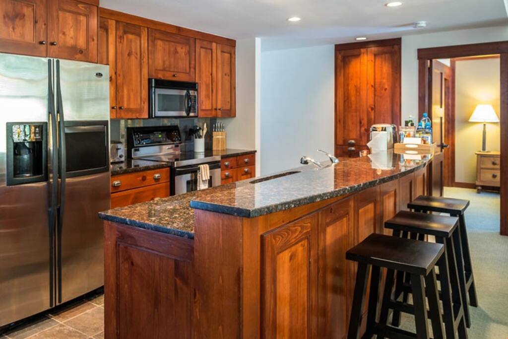 Take a seat at the breakfast bar or entertain at the dining room table.
