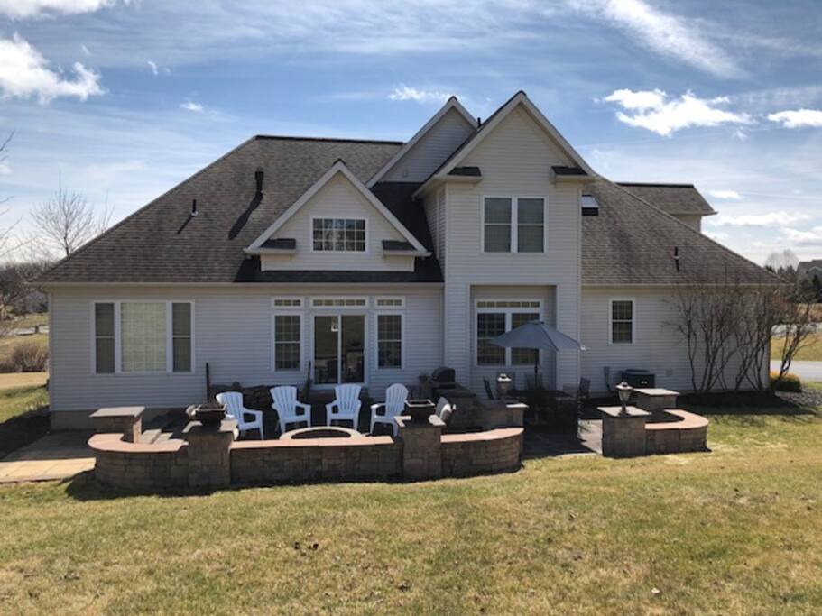 Patio with dining table & firepit