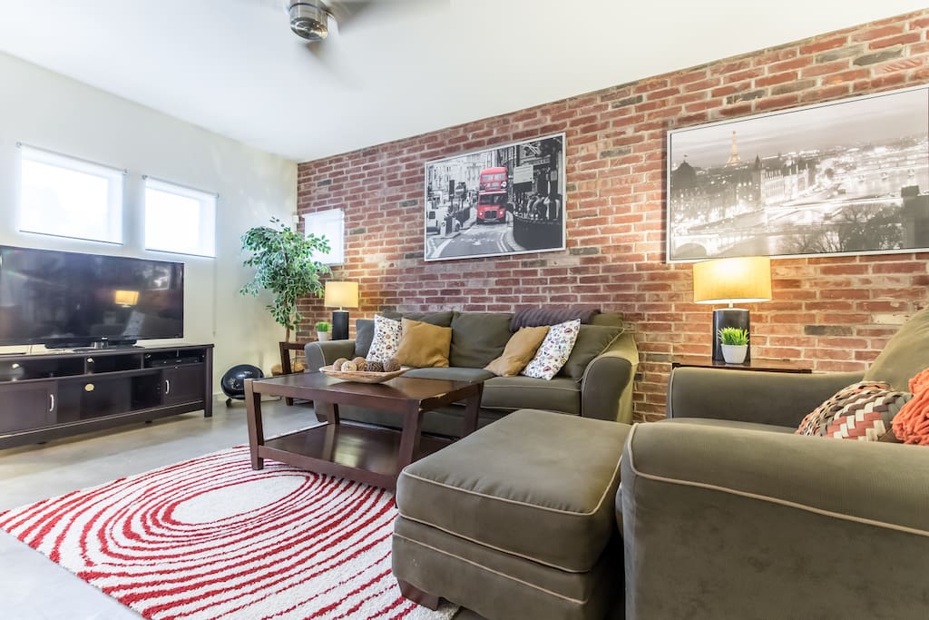 Super comfortable couches and high end finishes, all make for a great warm space.