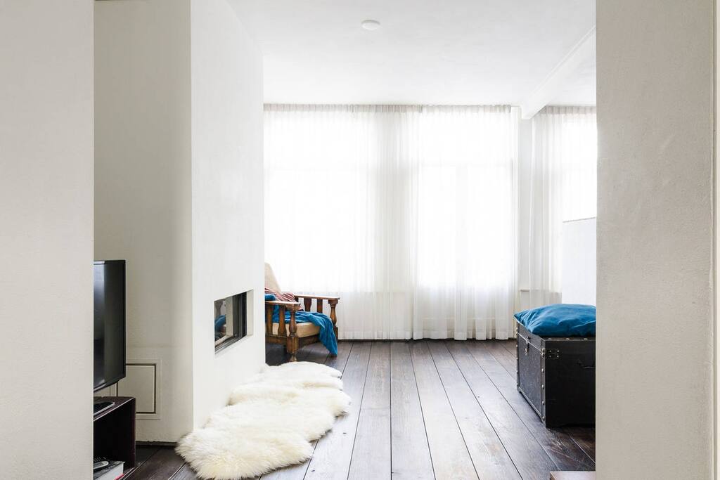 Bright living room with cozy fireplace