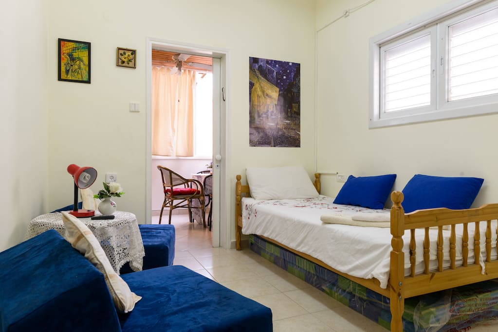 Second bedroom with large single bed, 2 futons & spare matresses