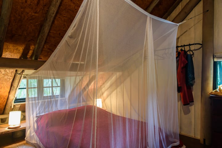 Mezzanine showing curtained double bed (available on both mezzanines)