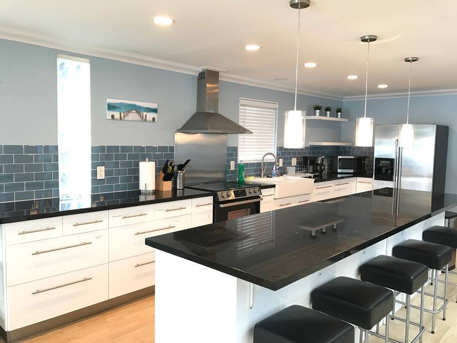 Huge kitchen with a long island, perfect for a large family.