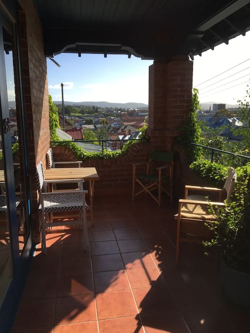 This is the front verandah which gets the morning sun and has views over Hobart city.