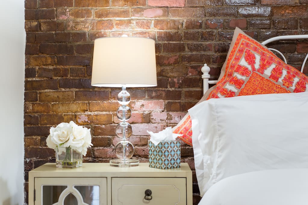 Bedroom #1 - features Queen Bed, one nightstand, a dresser, and closet