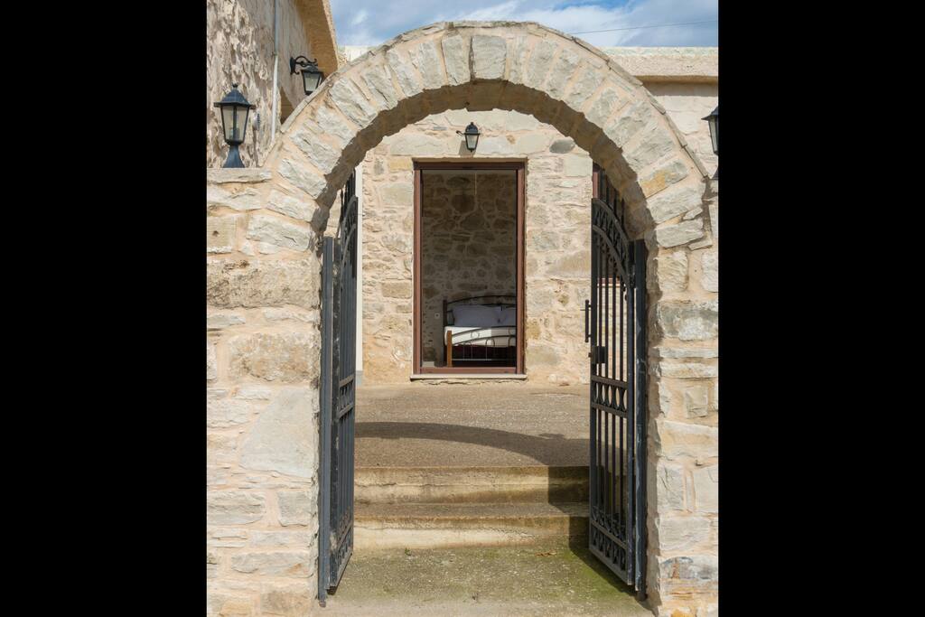 The front gate is wrought iron