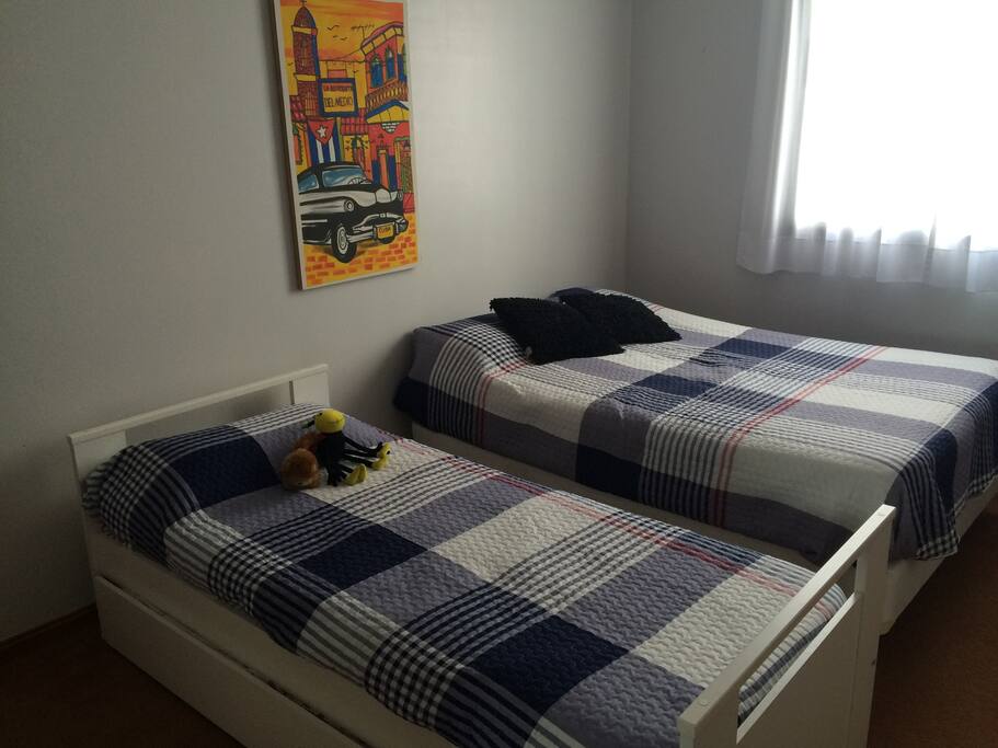 Confortable bedroom with a double bed (1.40 mts) and another single one.