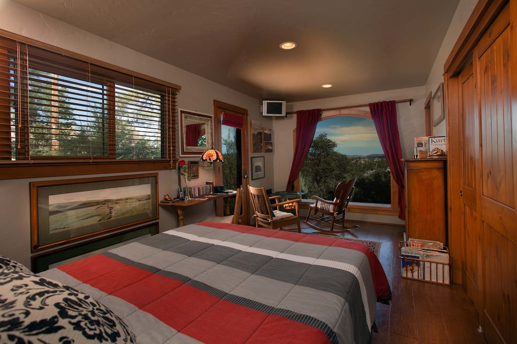 The main room, queen-sized bed,Sunrise/Moon-rise view, 19th century bookcase, closets