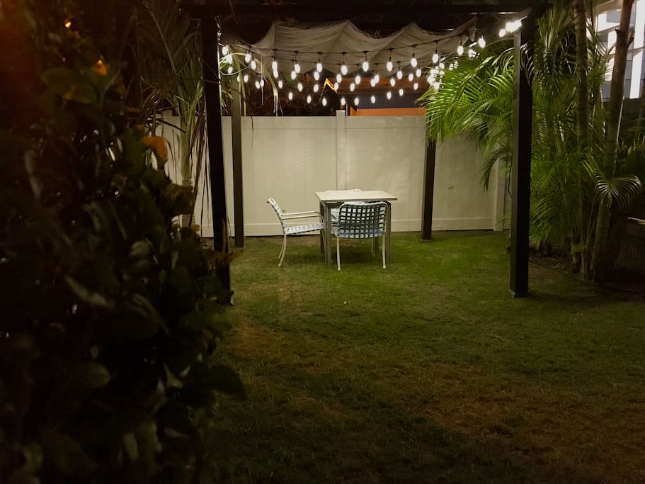 Main House: fully fenced yard with pergola; perfect for a family BBQ or outdoor meal together