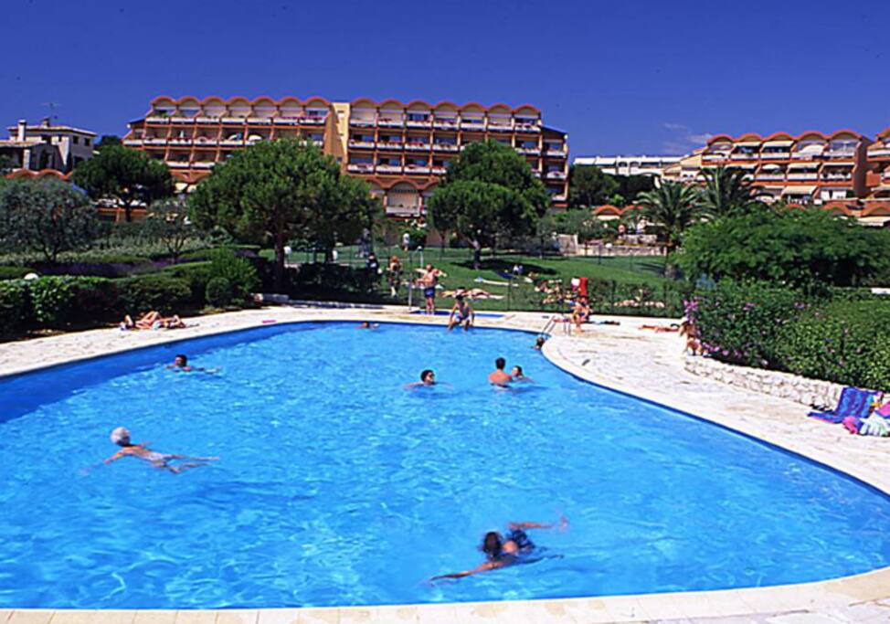 Apartment on top floor as seen from swimming pool