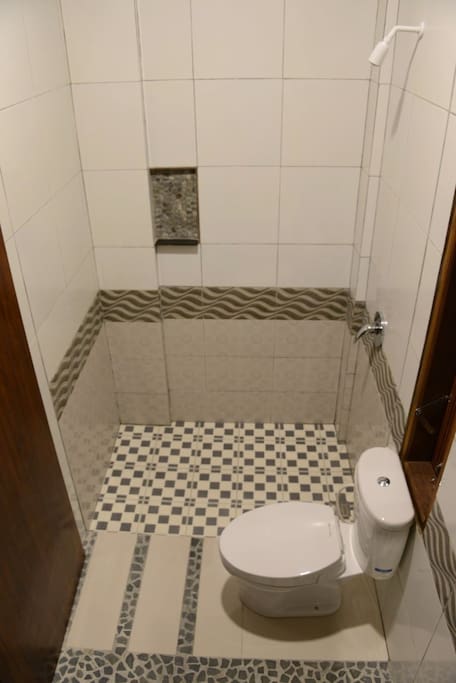 Private toilet for each room with modern shower and toilet