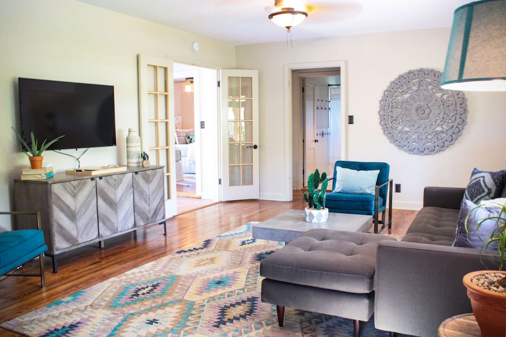 Living room with cable TV and plenty of seating.