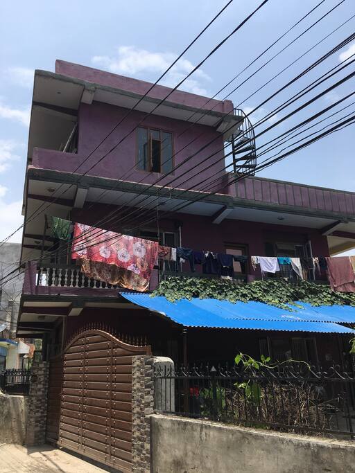 A street view of our spacious home. It has a gate to ensure safety.