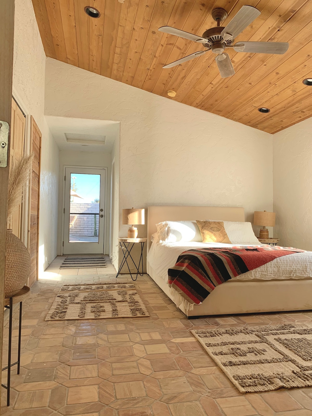 Bedroom 2 (queen bed) has its own private ensuite bathroom with shower and direct access to the pool.