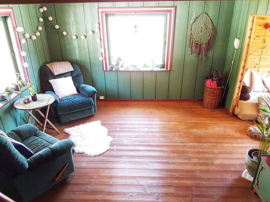 Large space for yoga, sitting with beautiul view of fjord