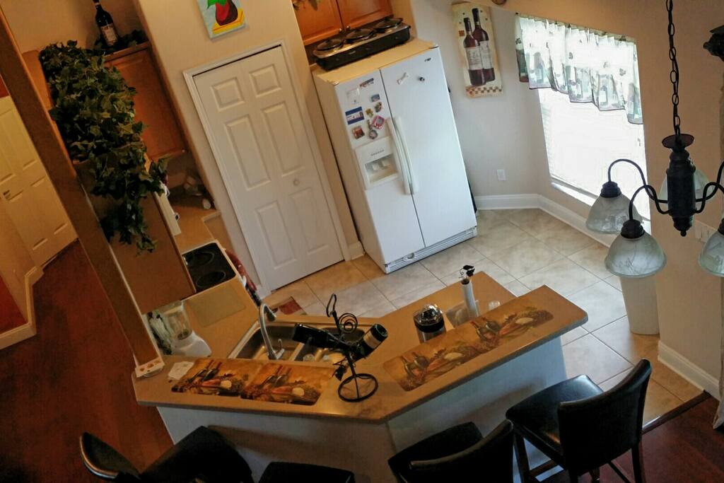 Kitchen. Microwave, stove, oven, refrigerator, dishwasher, toaster, coffee pot, blender