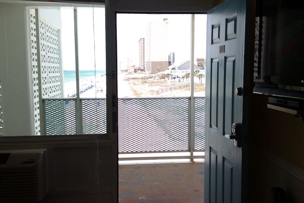 Looking out from the room to the Gulf and miles down the beach.