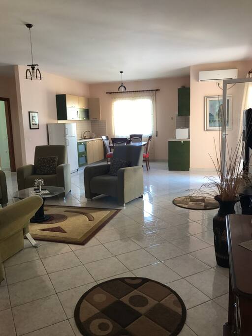 The living room and the kitchen