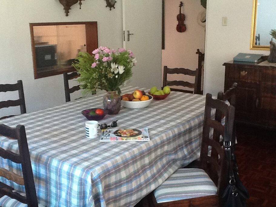 Dining room with a hatch through to the kitchen for easy-cleaning up.