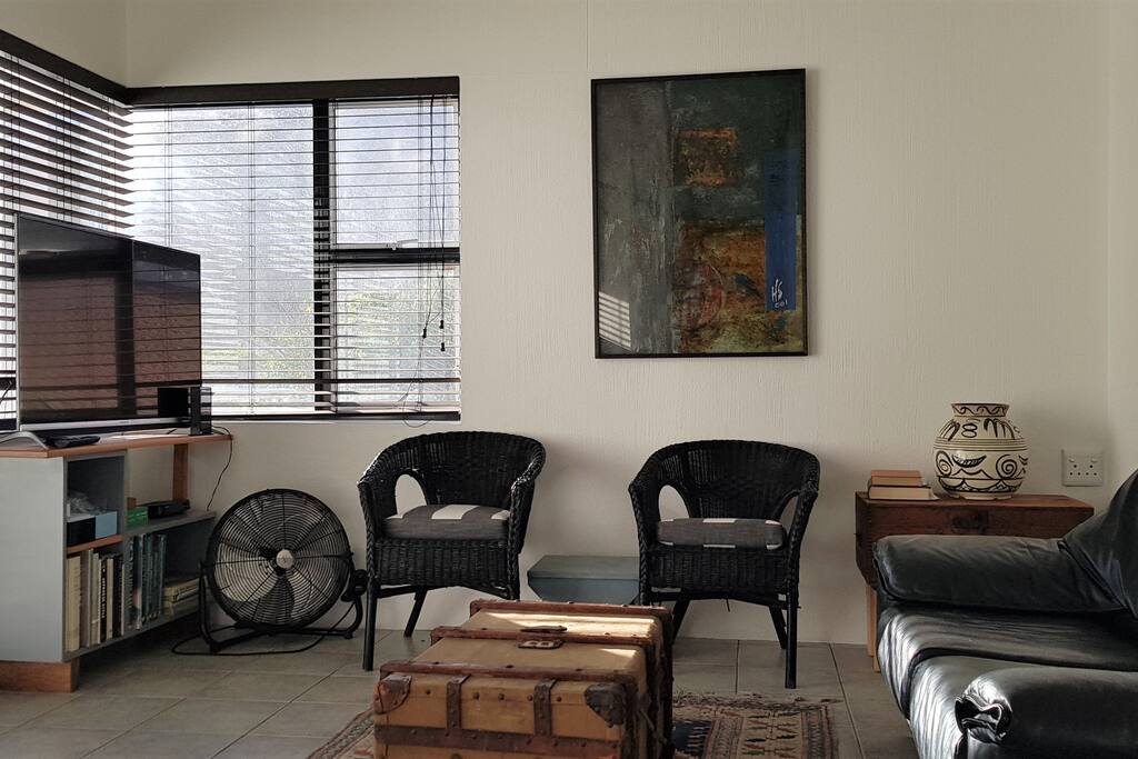 Upstairs Guest lounge facing onto balcony. With TV, Guest kettle and coffee/tea station.