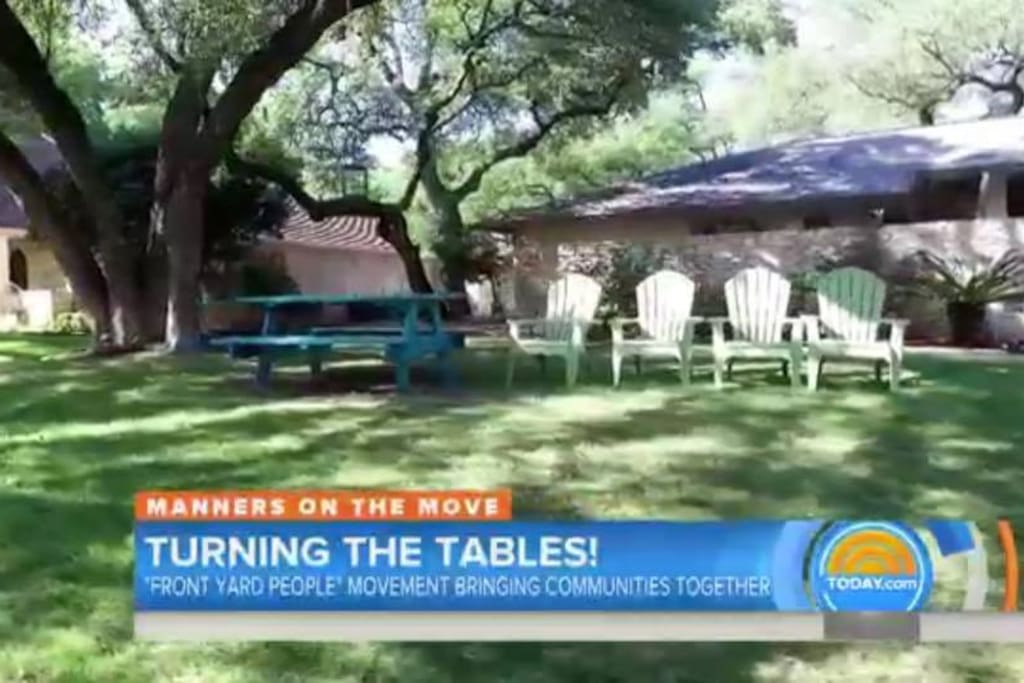Front of house: As featured on the Today Show, we have a Turquoise Table and lawn chairs for easy outdoor entertaining on our shady, tree-lined street.