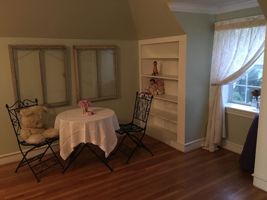 Sitting area for reading and floor space for yoga.