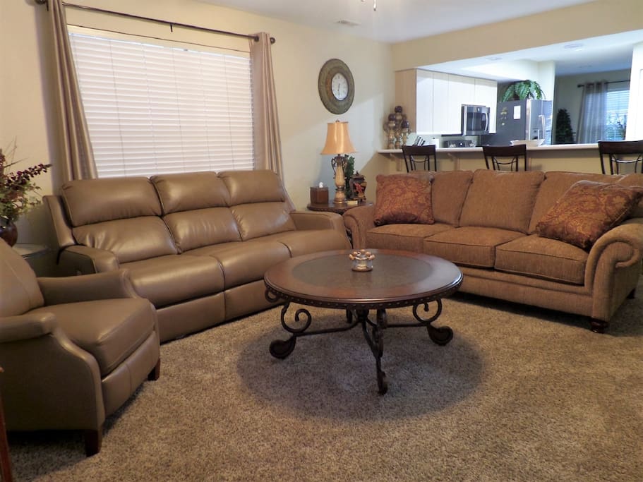 Living Area - Recliner, Reclining Sofa, and Queen Sofa Sleeper (All New)