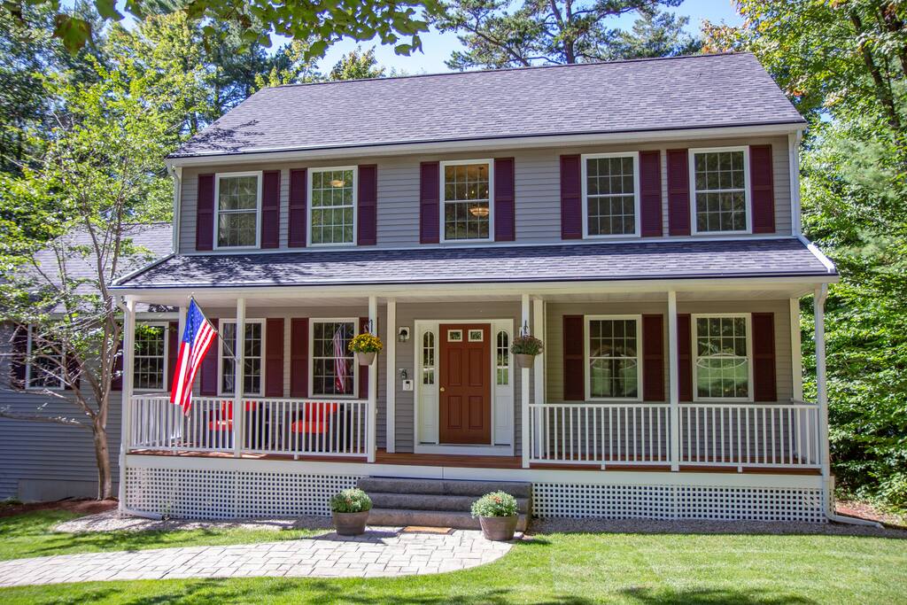Front view of the house.
Spacious porch with outdoor seating.