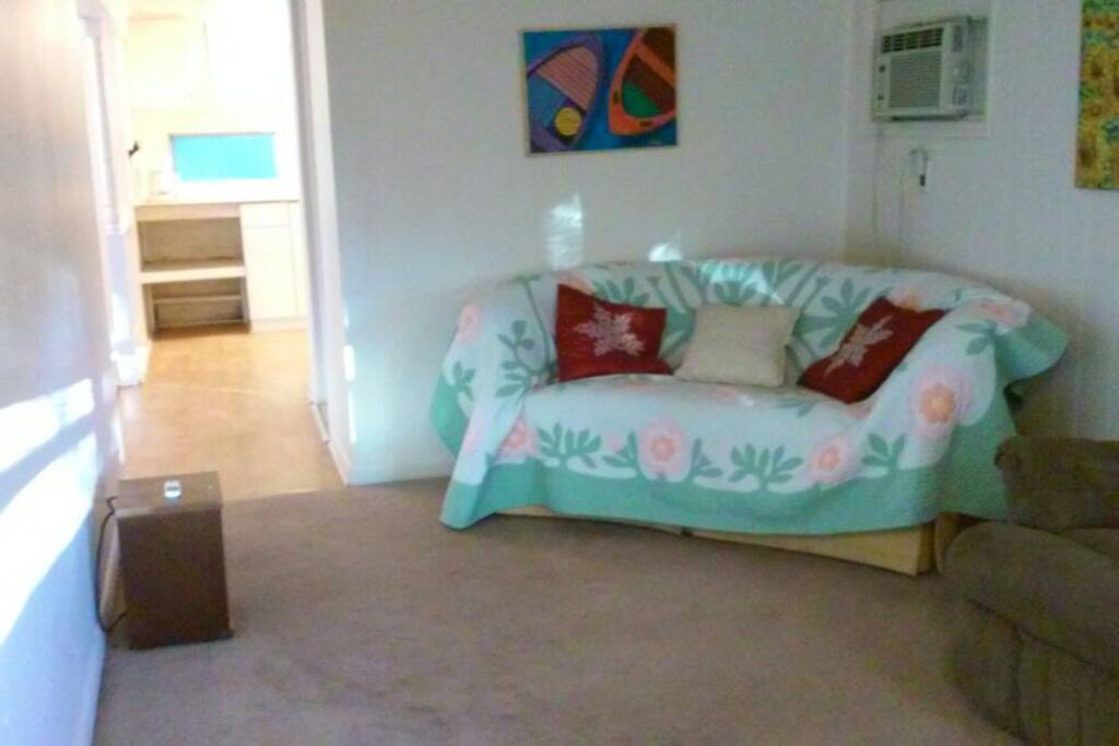 Sofa and portable heaters on each room.