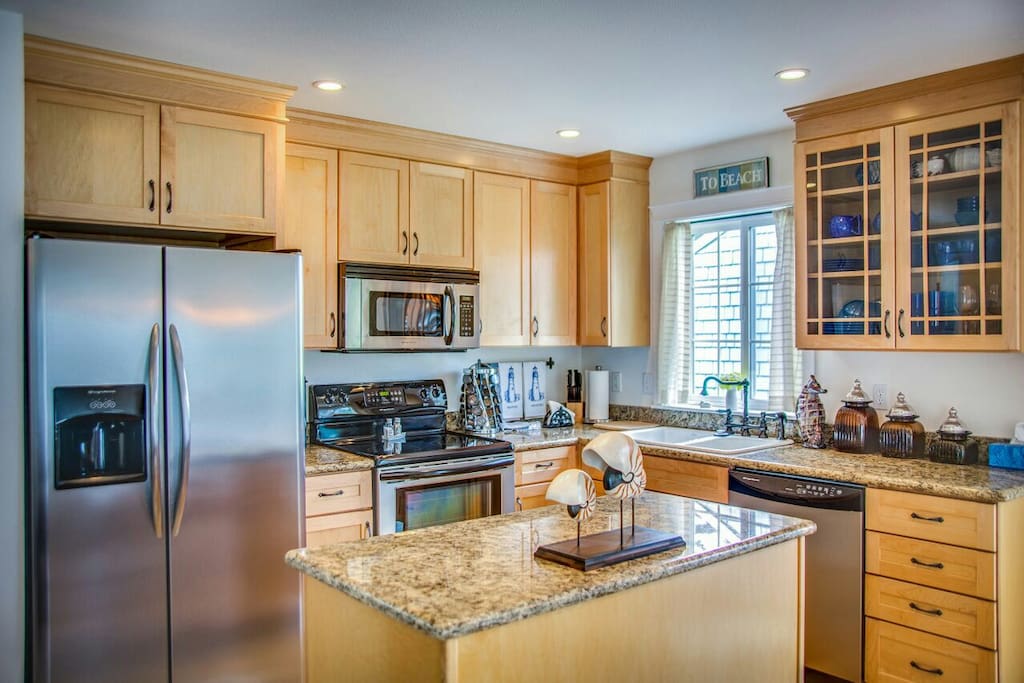Granite kitchen with stainless appliances