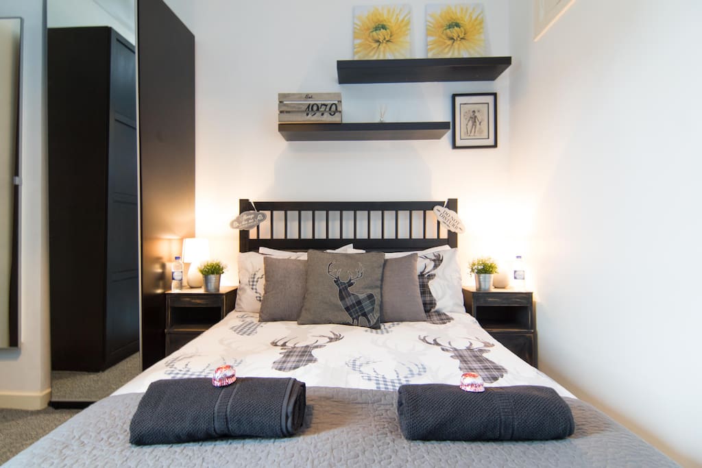 Rest your head in the comfortable double bed with ample pillows, cushions, and blanket.