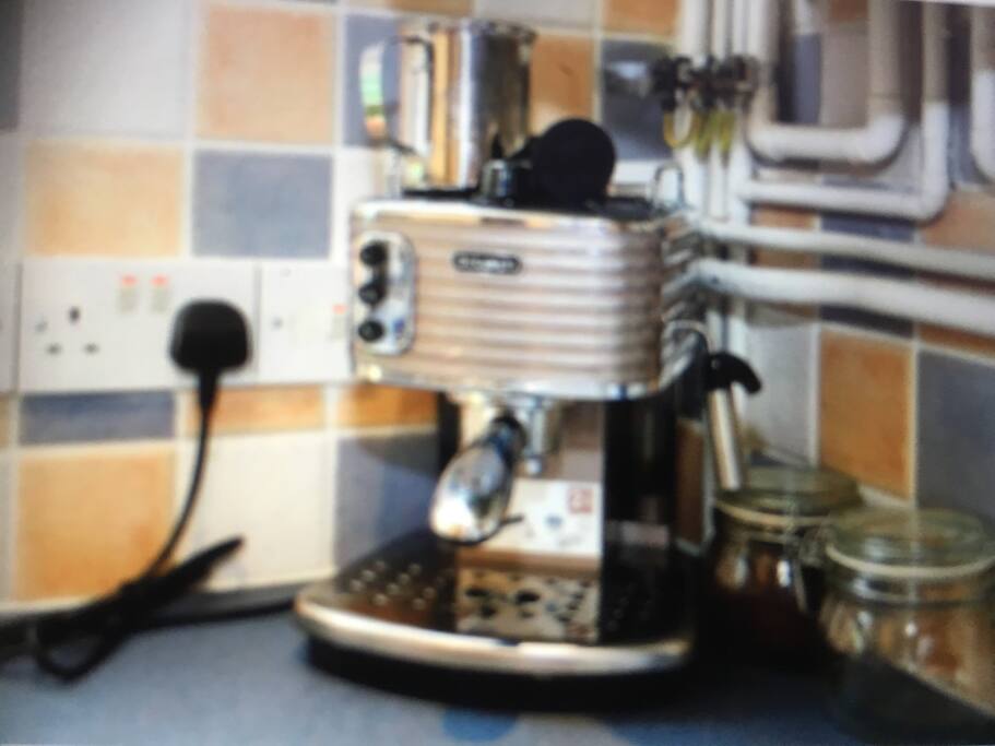 The DeLonghi coffee maker. Guests can help themselves to the coffee and tea etc in the kitchen.