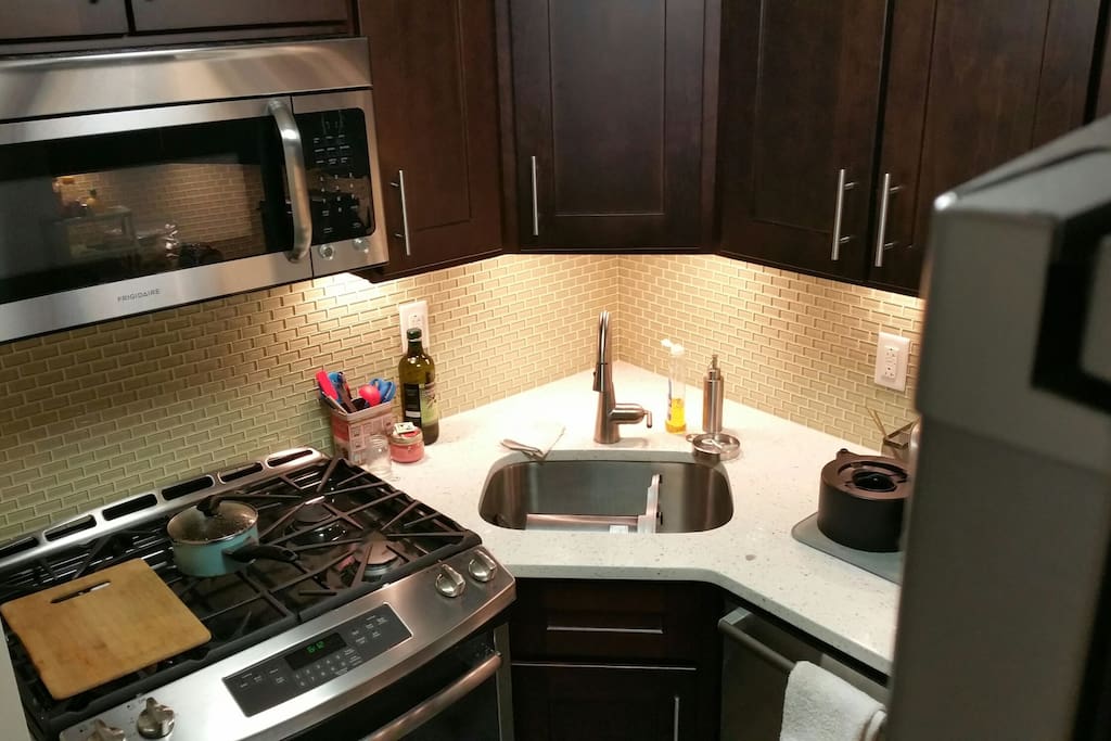 Microwave, 4 stove top burners, oven broiler and sink..