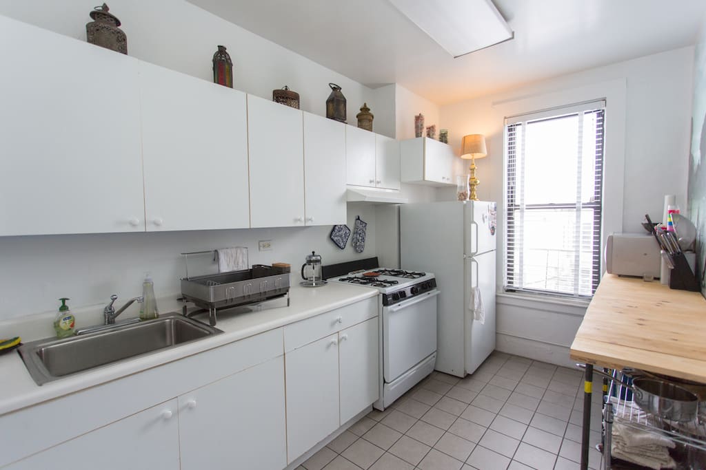 Well stocked Kitchen with pots, pans, plates/silverware