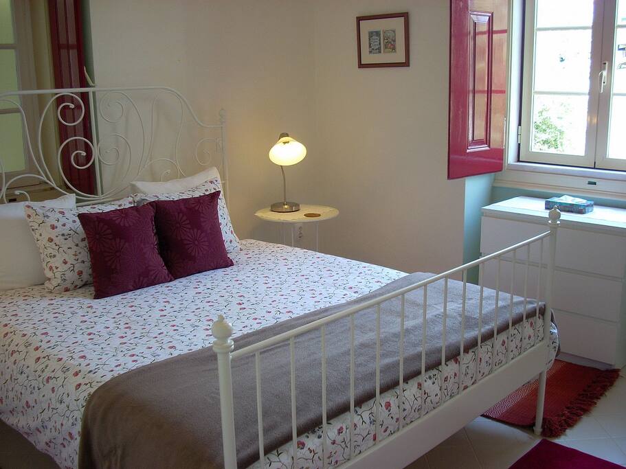The main bedroom is spacious and light, has a large double bed and en-suite bathroom