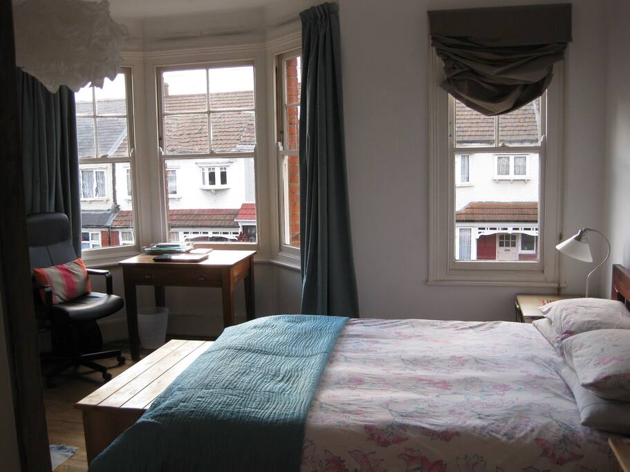 The room overlooks a quiet residential street