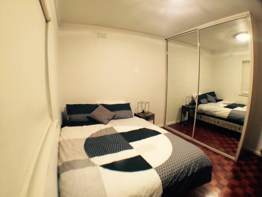 Master bedroom with queen size bed with linen provided and TV with DVD player.