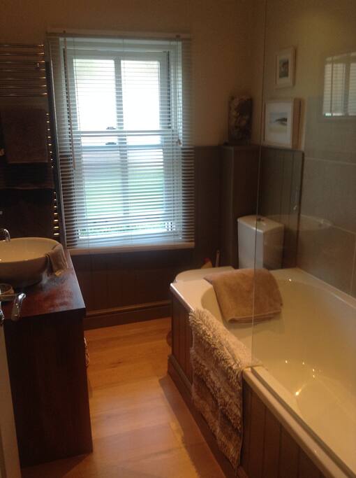 Very own family bathroom with shower and bath not shared with host