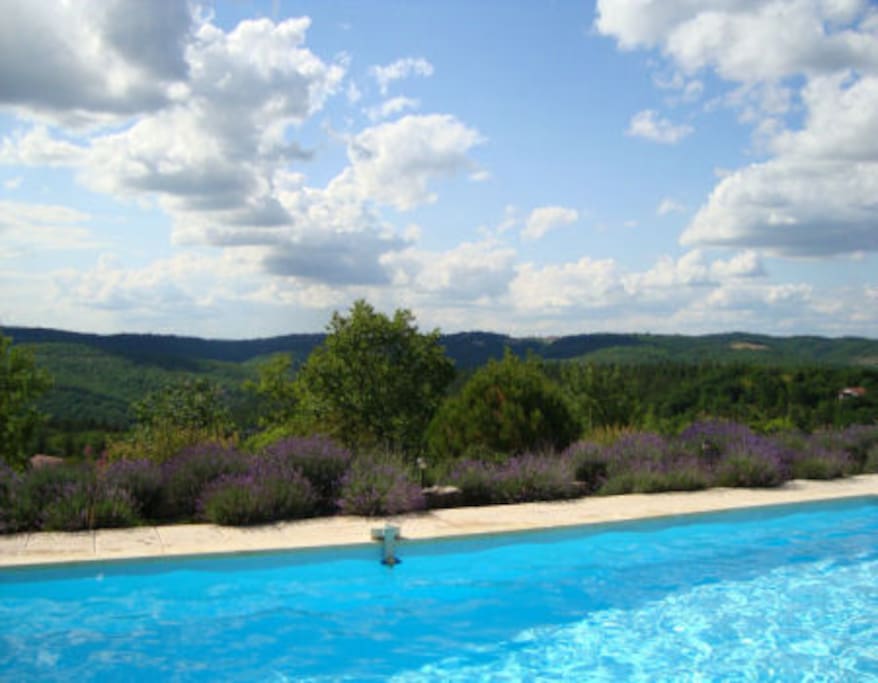 Pool with fence and views