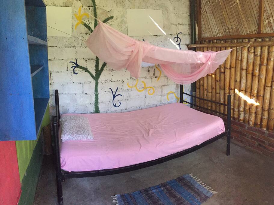 Bed with mosquito net