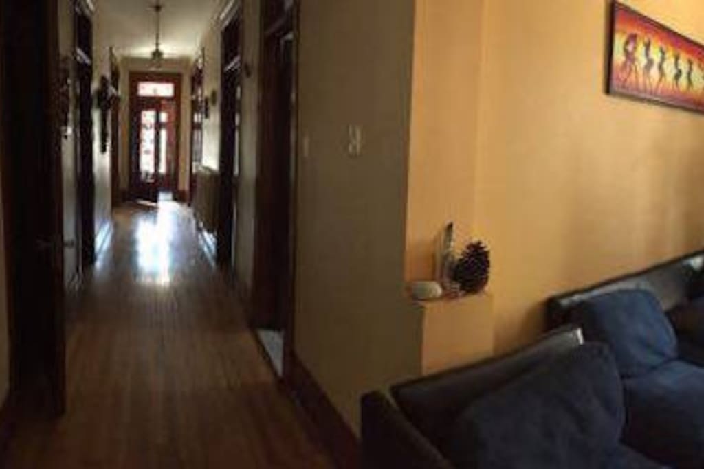 Big hallway ! Lovely masks and decor.