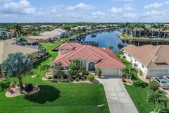 Spacious%2C+Waterfront+Home+with+Dock%2C+Heated+Pool%2C+and+Spacious+Lanai