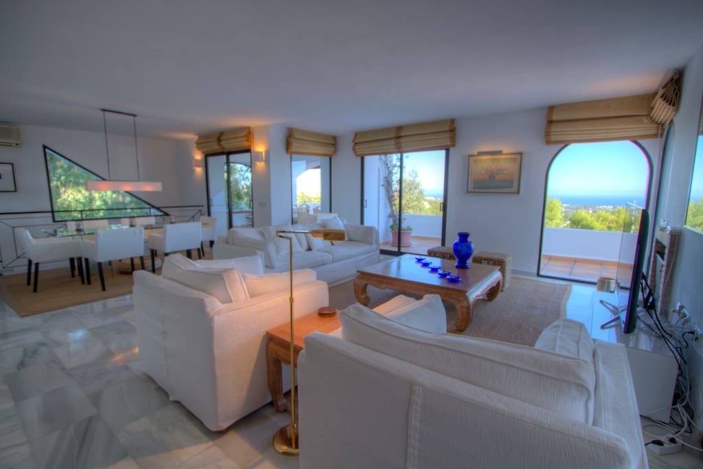 Ample and bright living room with sea views