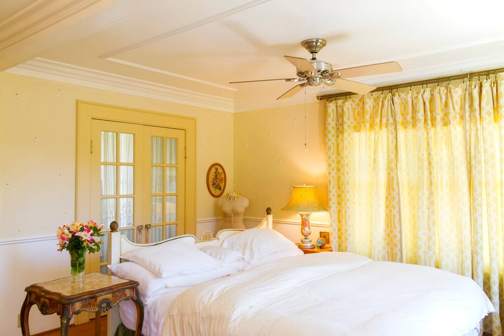 Custom made bed, with soft natural latex mattress, light and airy space.