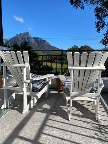 Open plan living beneath majestic mountain views gallery image 3